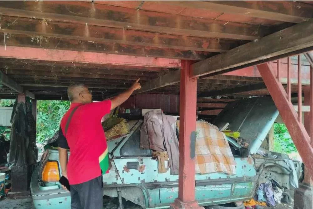 Image from: Suri rumah maut: Sempat beritahu suami kaki dicucuk dari bawah rumah, pisau ditemui di kebun