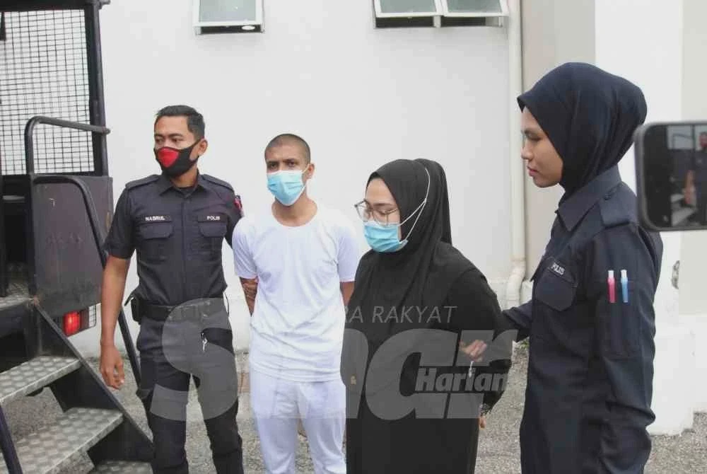 Image from: Suami isteri terlepas hukuman mati, menangis peluk ahli keluarga
