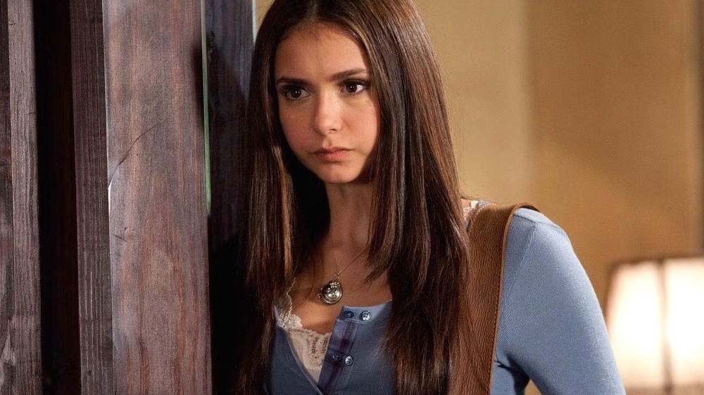 When does elena gilbert become a vampire in the vampire diaries 