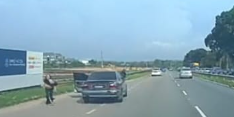 Woman jumps out of moving car following domestic dispute