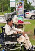 #MalaysiaKita | Pak Tam the Paralysed Artist in the Wheel Chair Who Celebrated Malaysia Day With Kopi O and Roti Mayat
