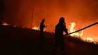 Three firefighters die battling wildfires in Greece