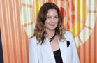 Drew Barrymore reunites with flight attendant four years after tearful encounter