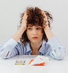 Consumer Confidence Just Hit a 12-Year Low — 7 Money Moves People Make When They’re Worried