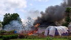 Angry crowd sets fire to Ebola treatment center in Congo