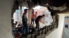 Gaza city residents survey destruction after overnight Israeli airstrike