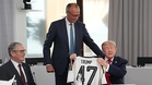 Watch: German chancellor surprises Trump with 'Trump 47' football jersey at G7