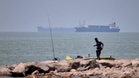 UK maritime agency raises Strait of Hormuz threat level after oil tanker reports being struck