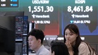 Asian stocks slide on chip sell-off as markets await US jobs data