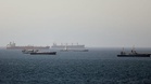 Oil tanker hit by 'unknown projectile' in Strait of Hormuz, British military says