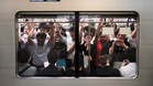 ‘I associate them with a day-off’: Tokyo workers encouraged to wear shorts to work to save on AC