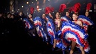 Moulin Rouge dancers welcome Tour de France finale in Paris