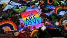 Mourners lay flowers and candles after deadly Berlin Pride attack