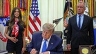 Trump signs order calling for fewer childhood vaccines, going against medical groups’ advice