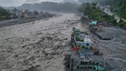 Authorities in Nepal carry out temporary burials of unidentified flood victims causing public outrage