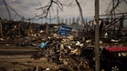 Russian strikes on warehouses leave Kyiv shops empty and destroy 12m school books ahead of new term