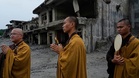Nepal holds a day of mourning and rescue efforts continue after flash floods kill 1,300