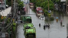 Bangkok streets turn to canals as days of heavy rain bring citywide flooding
