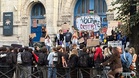 French protests over school conditions spread as students set fires and put up blockades