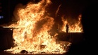 Barcelona housing protest erupts into clashes as barricades burn
