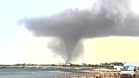 Tornadoes sweep across Sicily, leaving flipped cars and damaged buildings