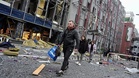 Russian drone attack kills two in Kyiv as residents survey damage