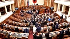 Scuffle breaks out in Albanian parliament as MPs clash over protests