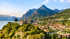 In Italy, this village famous for its olive groves offers incredible views of a lake and the lush mountains beyond