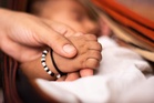 Meerut woman strangles infant son, tries to pass it off as death due to illness; held
