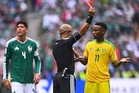 Three red cards as Mexico ease past South Africa in World Cup opener