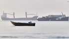 Middle East war live: US says it ‘downed’ Iranian drones targeting ships in Strait of Hormuz