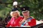 Queen dons black beret with white feather as she celebrates King's official birthday