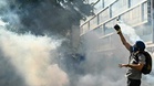 Swiss police fire tear gas as anti-G7 protesters target UN buildings