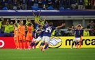 Japan come from behind twice to draw 2-2 with Dutch at World Cup