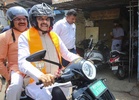 Madhya Pradesh CM Yadav rides electric scooter to Class 12 topper’s house in slum, wishes her success