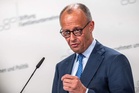 German conservative says Iran deal 'a disaster' as Merz welcomes news