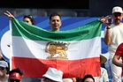 Iran football fans creatively sidestep FIFA’s ban on pre-revolutionary flag at World Cup