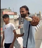 Money rains down on Panipat road: Man booked for throwing cash from flyover in Haryana to record viral reel