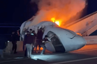 Plane bursts into flames after crashing into highway just three miles from airport