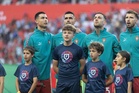 Why some teams stand sideways to sing the national anthem at the World Cup