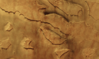 Mars Express Captures Giant Tornadoes Twisting Through Ancient Valleys