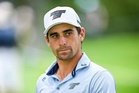 Andrew Coltart reacts to Joaquin Niemann being given two shot penalty for throwing a club at the US Open
