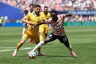 Co-hosts US sail into World Cup last 32 after Australia well beaten