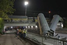 Freight train plunges from bridge in Germany