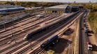 One dead and dozens injured after passenger trains collide north of London