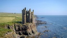In the UK, perched on Scotland’s wild northern cliffs, this dramatic castle is slowly being claimed by the sea (you’ll have to hurry to see it!)