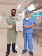 City surgeon completes advanced robotic oncology training in Japan