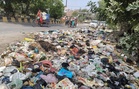 Mandir committee urges DC to clear garbage dump