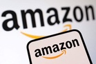 On India visit, Amazon CEO unveils q-comm push for 300 cities