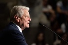 Former German leader says a female president would be a good sign